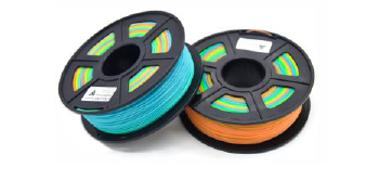 light blue and orange filament reels