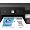 A sublimation printer in use printing a design.