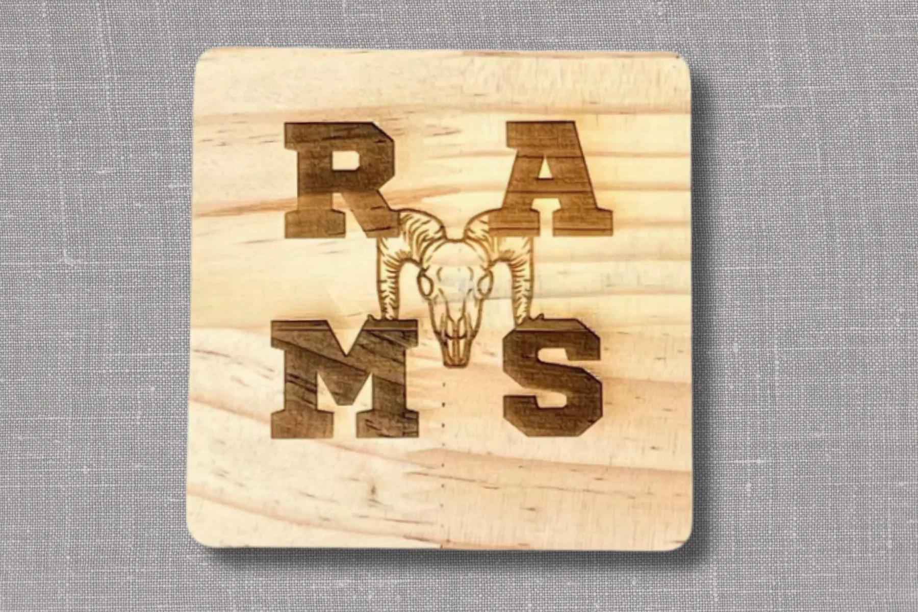 Coaster engraved with AGC's Laser Lab engraver