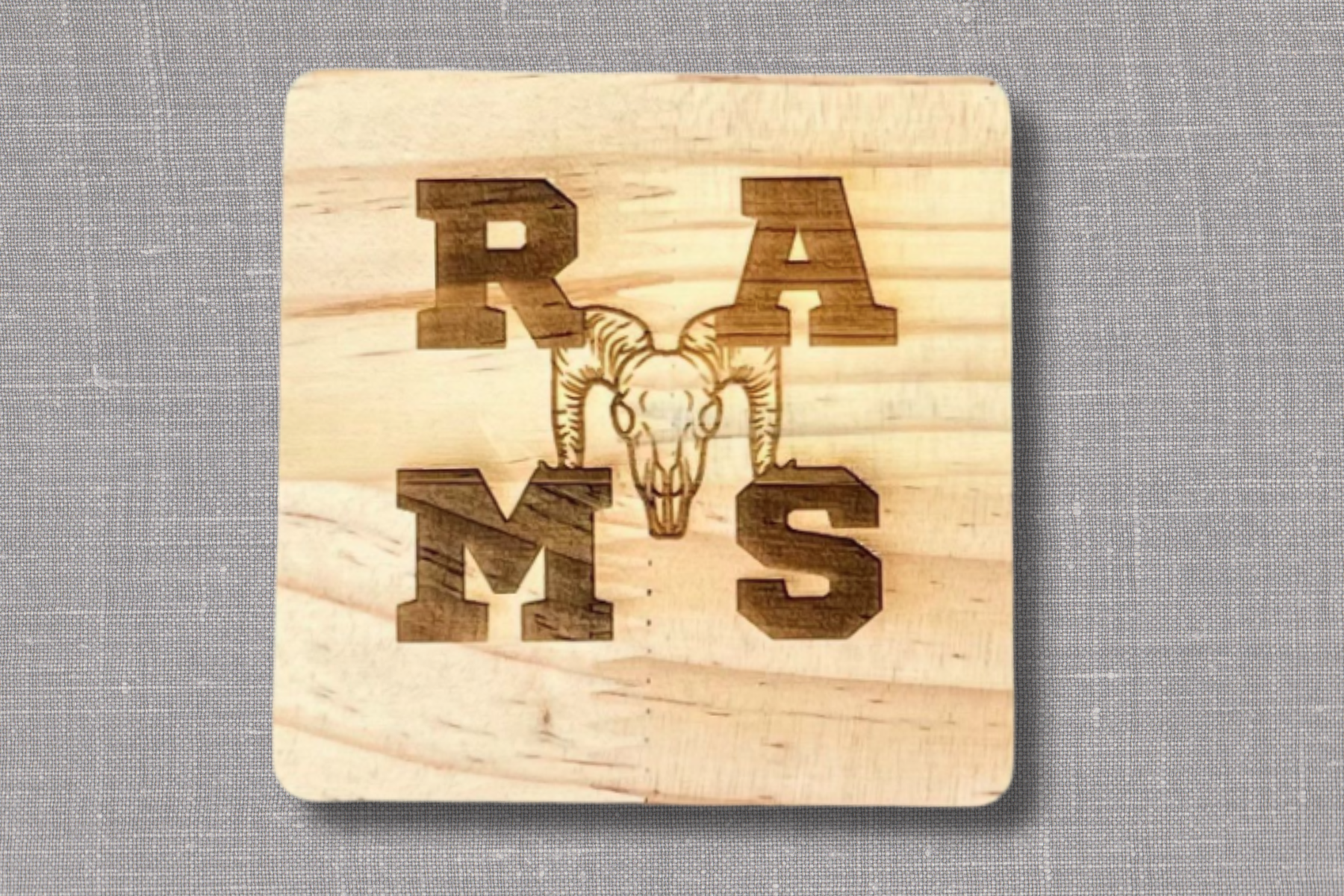 Coaster engraved with AGC's Laser Lab engraver